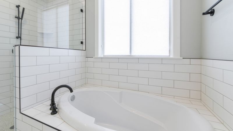Refinished Bathtub with Decorative Tiles